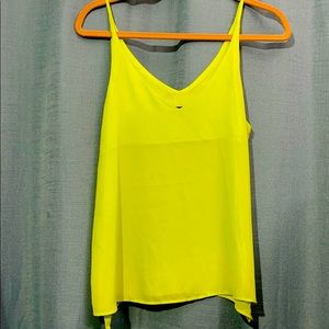 Bright yellow sleeveless blouse